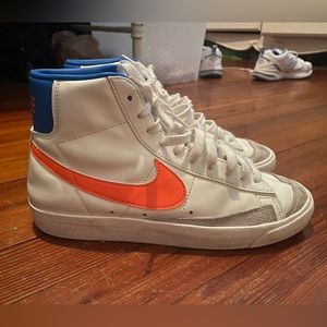 In perfect condition nike blazers orange and blue size 9.5